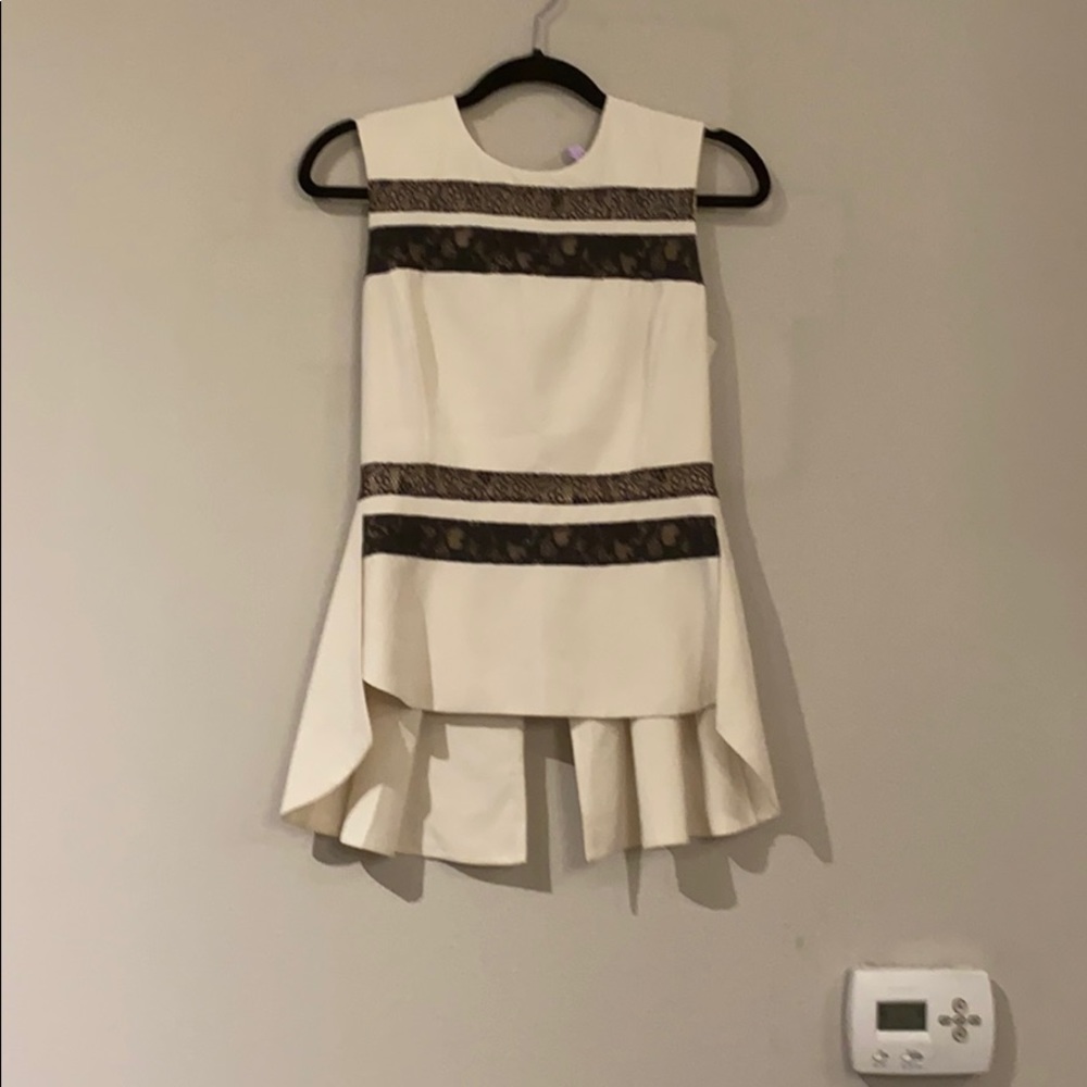 BCBG Sienna Peplum Top with black lace